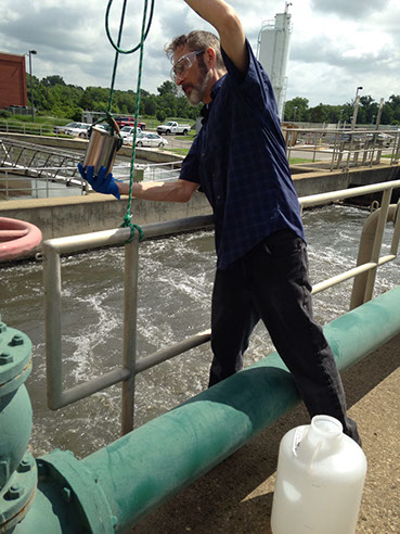 2015 RET participant David Bennett sampling wastewater