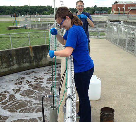 2015 RET participant Sara Hettenbach sampling wastewater